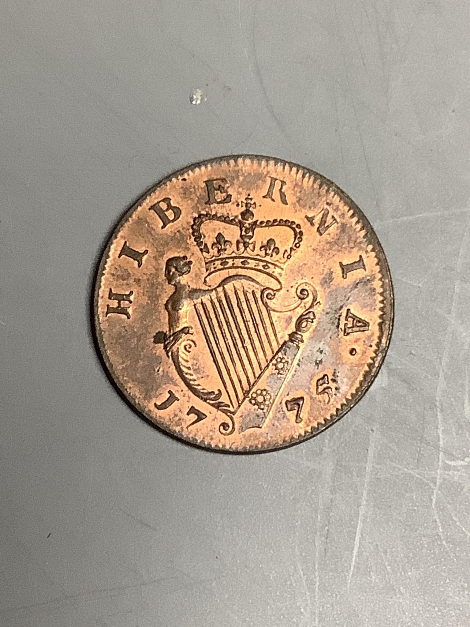 Ireland coins, a George III Irish Halfpenny, 1775, Type III, laureate bust with long hair, rev. crowned harp (DF 584; S.6614), weakness to edge otherwise about uncirculated, with some original lustre